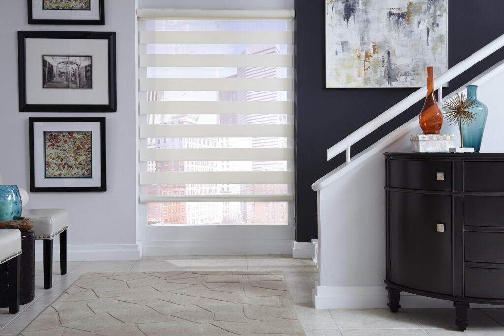 Band shade in the open position in a modern entryway with city views in Bridgeland, TX